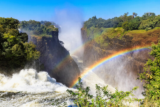 Southern Africa, Zimbabwe, Victoria Falls, Devil's Cataract with rainbow