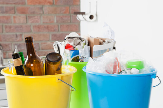 Germany, Cologne, Buckets with household garbage