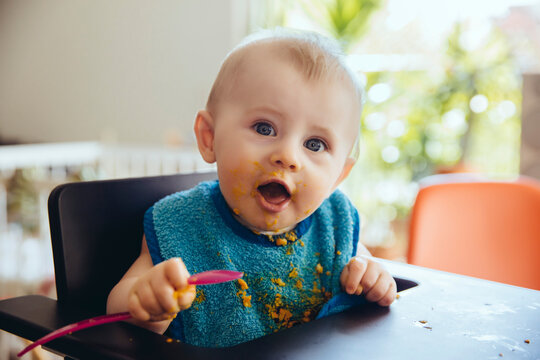 Portrait of baby boy after having a meal