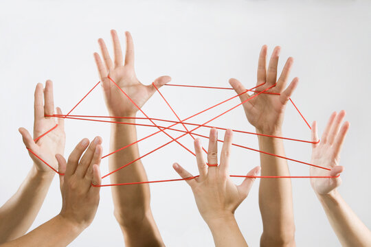 People playing cat's cradle
