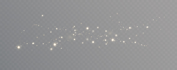Obraz premium Christmas glowing light effect with sparkling magic dust particles. Golden glitter stars shine with festive radiant light on transparent background.