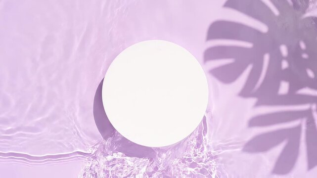 Top view of a white circular pedestal surrounded by gently flowing water in a tropical atmosphere with purple background