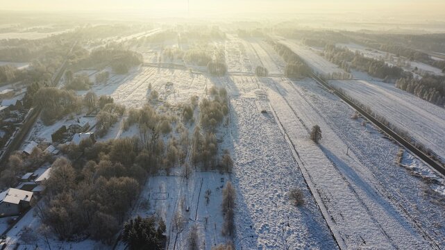 Cool climate landscape with snow covered roads