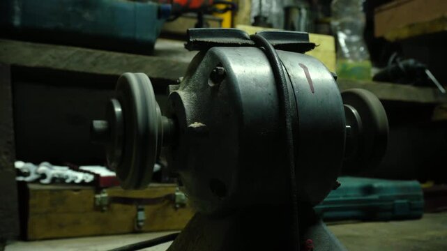 old sharpener for sharpening and processing metal or wood with two wheels