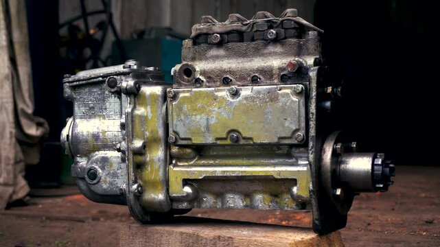 an old high-pressure diesel pump from a tractor after repair and adjustment