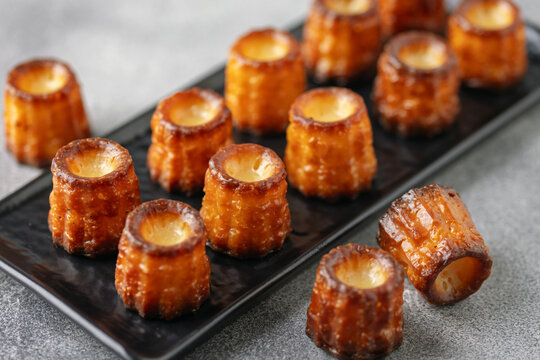 Caneles de bordeaux - traditional French sweet dessert