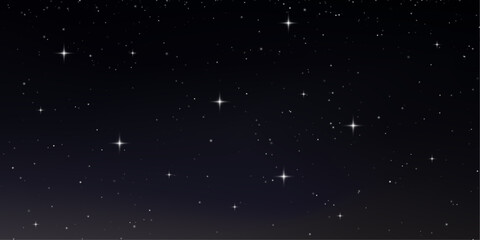 Cosmic clouds swirl across a dark sky above mountains. The Milky Way glows like a celestial ribbon. Silence and awe fill the scene. © Freesstock