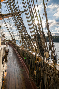 Rope rigging tied in intricate manner on deck of tall ship