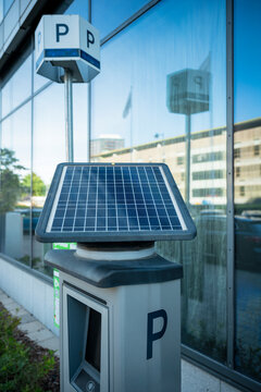 View of automatic parking ticket dispenser powered by solar cells