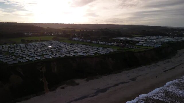 Sunset Aerial View of East Runton Coastal Cliffs Caravan Park and Beach Near Cromer Norfolk