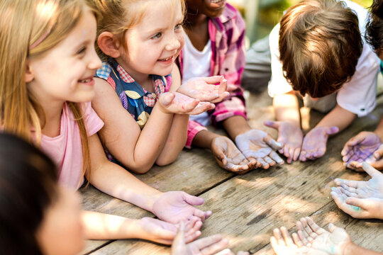 Children sharing joyful moments outdoors