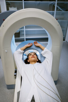 High angle view of female patient undergoing medical test at clinic