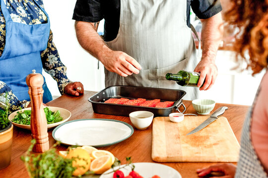 Cooking salmon with fresh ingredients
