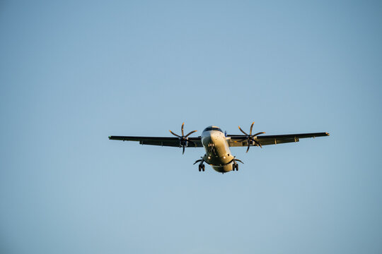 Low angle view of aircraft flying high in sky