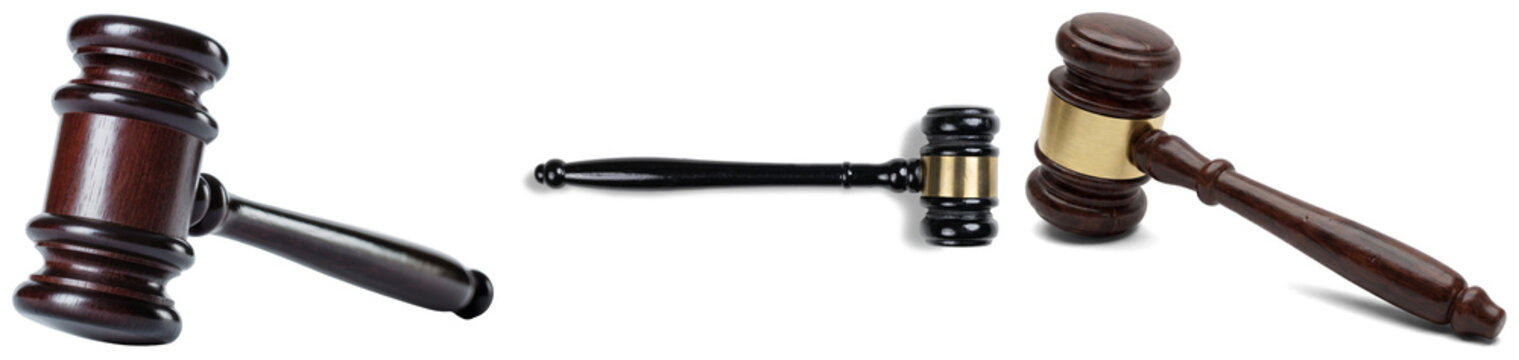 Three wooden gavels with brass accents, isolated on a white background