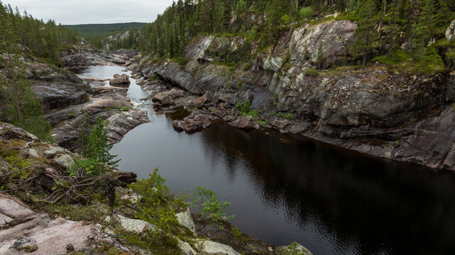 High angle view of river in middle of rock formations