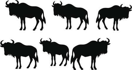 African wildebeest wild animal black silhouette vector set with horned gnu safari shapes isolated on transparent background © Olivia