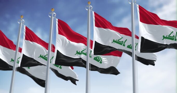 Republic of Iraq national flags waving on a clear day. Three horizontal red, white, and black stripes with a green Takbir text. Seamless 3d render animation. Slow motion loop. Selective focus
