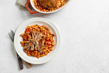 Fototapeta premium Oven Baked Pork meat and Beans on plate