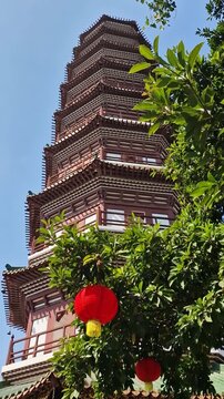 Vertical View, Pagoda of Buddhist Temple in Guangzhou, China. Six Banyans Trees Temple
