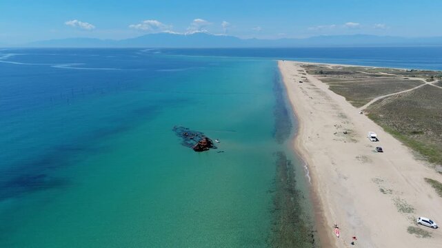 Overhead aerial perspective of the iconic Epanomi shipwreck beach in the Thermaikos Gulf region
