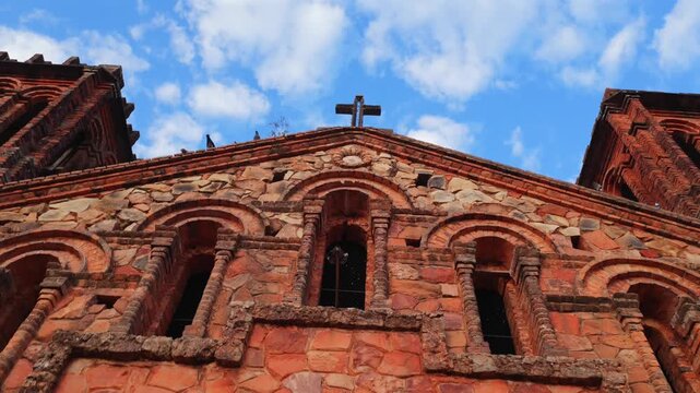 Architectural Facade Of Ntra. Sra. de la Asunci&oacute;n de Ybaroty Catholic Church In Villarrica, Paraguay. FPV Tracking Shot