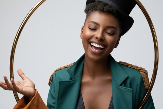 Smiling woman portrait in teal coat with gold epaulette and black top hat for fashion portrait and editorial banner design