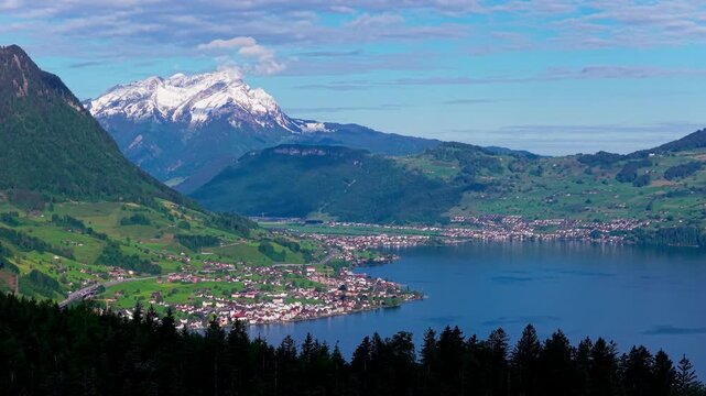 lake lucerne in switzerland with swiss town and mount pilatus in the background