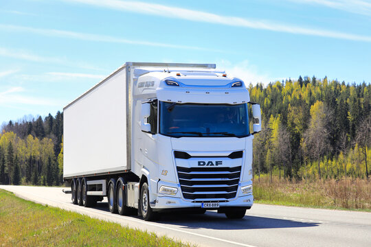 New White DAF XG Truck Semi Trailer Delivers Load.