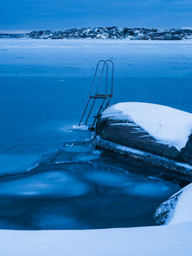 Shot of swimming ladder in frozen lake
