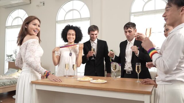 Pride and LGBTQ festival concept. Celebrating equal marriage: men and women happily marry, toasting with white wine, clinking glasses, partying, and dancing together.