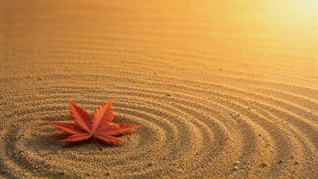 Single Autumn Maple Leaf on Zen Garden Sand Ripples at Golden Hour with Copy Space