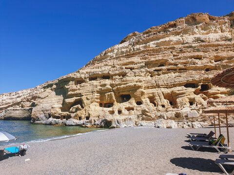 Matala beach and its caves, popular beach in Southern Crete Island, Crete Island, Grece