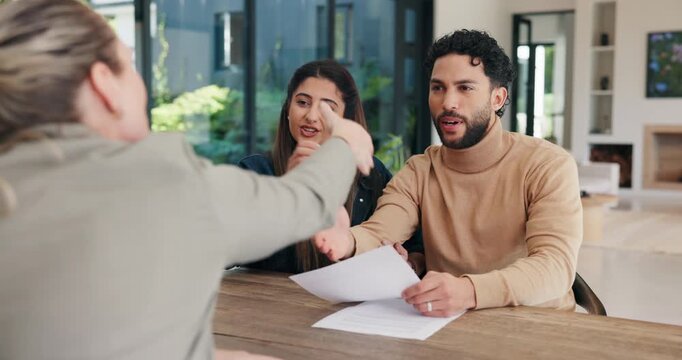 Financial advisor, handshake and document with couple in home for budget review or investment planning. Paperwork, conversation and shaking hands with people in house for finance or wealth management