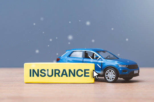 Car insurance policy concept with toy vehicle and text on a yellow block. Auto coverage contract, transport safety guarantee or financial protection presentation background with copy space.