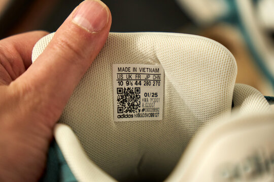 Tyumen, Russia-April 10, 2026: Detailed view of shoe identification markers. Comprehensive description of shoe serial number