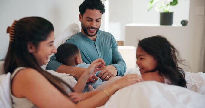 Tickle, parents or children on bed with bonding together, childcare or humor in healthy relationship. Laugh, happy or people in house with connection, family fun or playful time at start of day.