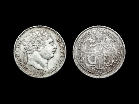 George III silver sixpence Bull Head coin obverse and reverse dated 1819 of the United Kingdom cut out and isolated on a black background, British and English coinage stock photo image