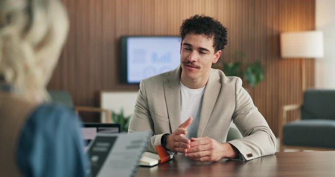 Office, discussion and man with HR for interview, questions and explaining job experience in meeting. People, conversation and recruiter with resume, hiring process and career opportunity in business