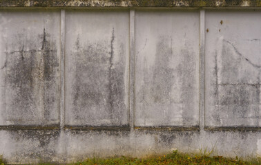 Fototapeta premium Concrete panel details. Detailed view of textured concrete showing mold marks and weathering effects