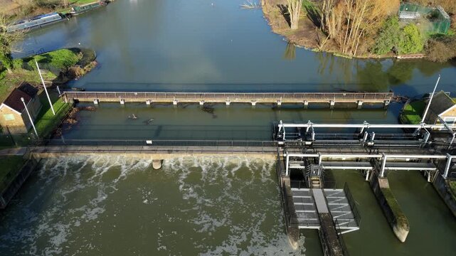 Drone view of industrial sluice gates and navigation locks on the River Lea, England.