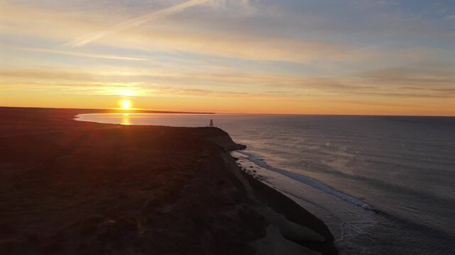 Aerial Panning of Sunrise Over Atlantic Coast and Cliffs in Puerto Madryn Patagonia Argentina