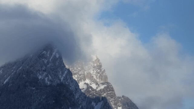 Churfirsten mountain snow clouds covered peak alpine Switzerland high altitude