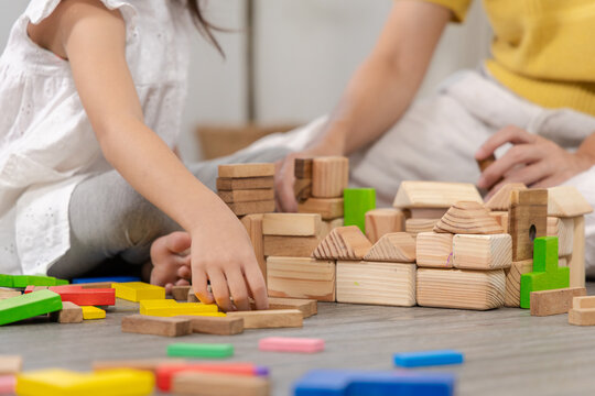 mother, daughter, family, education, homeschool happy child playing wooden toy block with parent, joyful learning, intelligence knowledge and emotional quotient, happy children play and learn