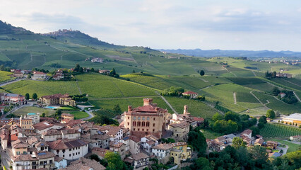 Fototapeta premium Aerial View of Barolo Village and Castle Amidst Piedmont Vineyard Hills