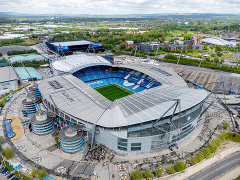 Etihad Stadium, Manchester City Football Club, aerial view of the modern football stadium and surrounding sports campus in Greater Manchester. 