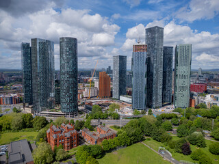 Obraz premium Manchester city centre and Deansgate towers, modern skyscrapers and high-rise architecture shaping the Greater Manchester skyline.
