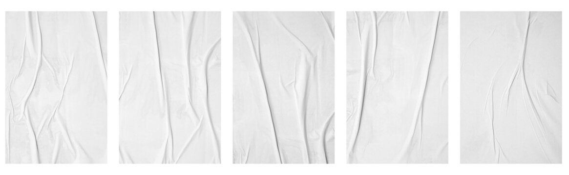 white crumpled and creased glued mockup paper poster template set isolated on black background