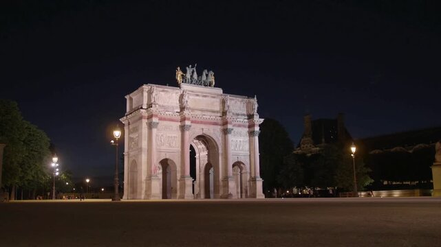 Arc de Triomphe monument with traffic on Champs Elysees in Paris France in 4K
