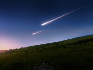 Fireballs in the dawn sky. Astronomical landscape with meteor trails over the hills. Celestial bodies, astrophotography. © Nazarii